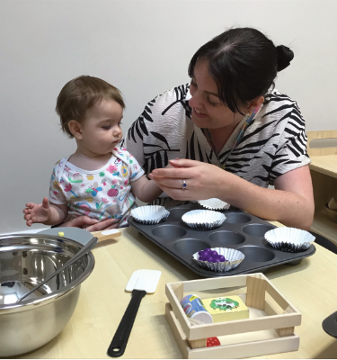 Victoria Park Deputy Manager engaging with a Child
